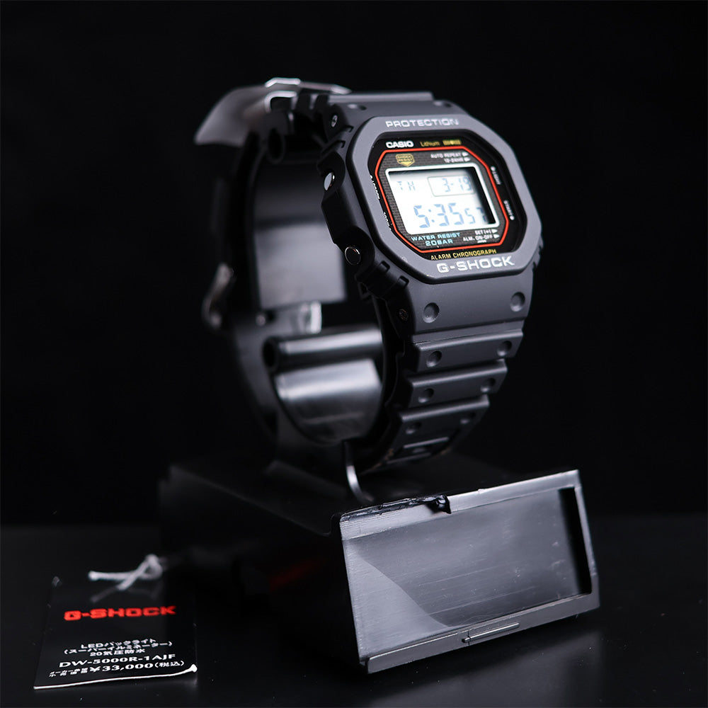 Reloj Casio G-Shock DW-5000R-1AJF 40 Aniversario AUTOGRAFIADO a beneficio